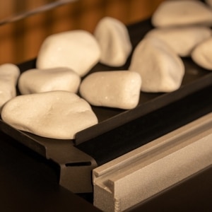 Tray with decorative white stones close up